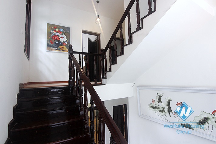 White house with courtyard for rent in Tay Ho district  
